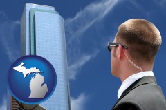 michigan map icon and security agent watching a downtown area