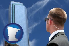 minnesota map icon and security agent watching a downtown area